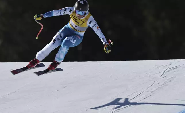 United States' Breezy Johnson speeds down the course during a women's downhill race, at the Alpine Ski World Championships, in Saalbach-Hinterglemm, Austria, Saturday, Feb. 8, 2025. (AP Photo/Marco Trovati)