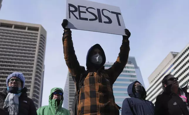 Protesters demonstrate against Project 2025, in Philadelphia, Wednesday, Feb. 5, 2025. (AP Photo/Matt Rourke)