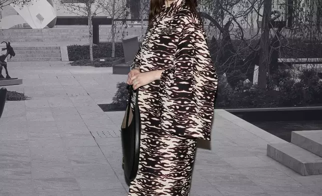 Alexandra Daddario arrives at the Tory Burch Fall/Winter 2025 fashion show as part of New York Fashion Week on Monday, Feb. 10, 2025, at the Museum of Modern Art in New York. (Photo by Charles Sykes/Invision/AP)