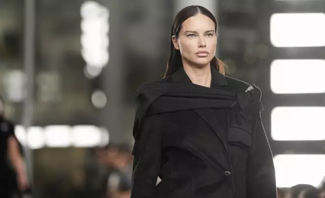 Adriana Lima walks the runway during the Tory Burch Fall/Winter 2025 fashion show as part of New York Fashion Week on Monday, Feb. 10, 2025, at the Museum of Modern Art in New York. (Photo by Charles Sykes/Invision/AP)