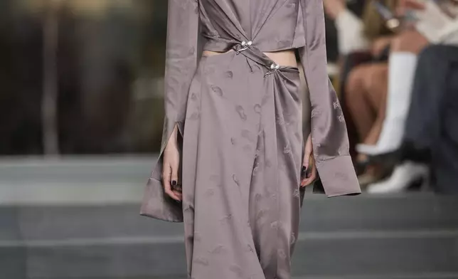 A model walks the runway during the Tory Burch Fall/Winter 2025 fashion show as part of New York Fashion Week on Monday, Feb. 10, 2025, at the Museum of Modern Art in New York. (Photo by Charles Sykes/Invision/AP)