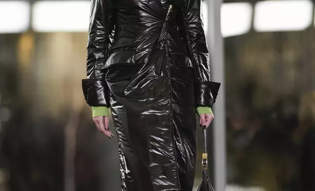 A model walks the runway during the Tory Burch Fall/Winter 2025 fashion show as part of New York Fashion Week on Monday, Feb. 10, 2025, at the Museum of Modern Art in New York. (Photo by Charles Sykes/Invision/AP)
