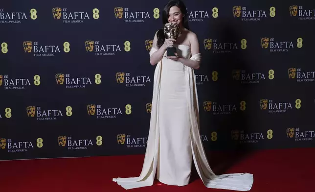 Mikey Madison poses with the leading actress award for 'Anora' at the 78th British Academy Film Awards, BAFTA's, in London, Sunday, Feb. 16, 2025. (Photo by Joel C Ryan/Invision/AP)