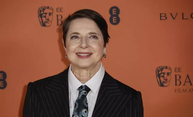 Isabella Rossellini poses for photographers upon arrival at the BAFTA Nominees Party on Saturday, Feb. 15, 2025, in London. (Photo by Joel C Ryan/Invision/AP)