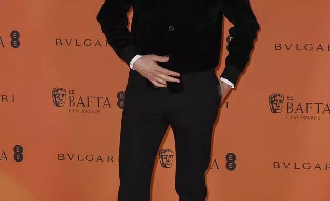Adrien Brody poses for photographers upon arrival at the BAFTA Nominees Party on Saturday, Feb. 15, 2025, in London. (Photo by Joel C Ryan/Invision/AP)