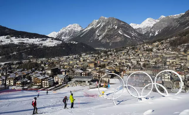 Olympic rings are seen near a slope of the Stelvio Ski Center, venue for the alpine ski and ski mountaineering disciplines at the Milan Cortina 2026 Winter Olympics, in Bormio, Italy, Thursday, Jan. 16, 2025. (AP Photo/Luca Bruno)