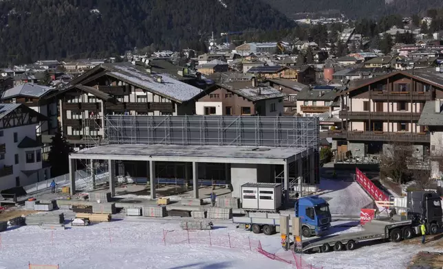 Construction work is seen at the Stelvio Ski Center, venue for the alpine ski and ski mountaineering disciplines at the Milan Cortina 2026 Winter Olympics, in Bormio, Italy, Thursday, Jan. 16, 2025. (AP Photo/Luca Bruno)