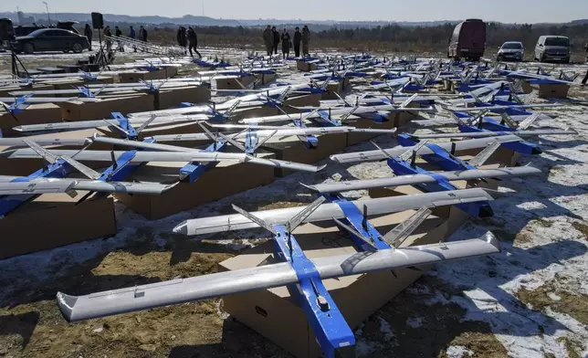 Ukrainian-made fixed-wing Besomar 3210 drone interceptors are handed over to the Armed Forces by Kozytskyi Charity Foundation in an undisclosed location in the Lviv region, western Ukraine, Friday, Feb. 21, 2025. (AP Photo/Mykola Tys)
