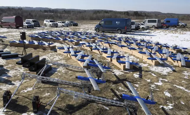 Ukrainian-made fixed-wing Besomar 3210 drone interceptors are handed over to the Armed Forces by Kozytskyi Charity Foundation in an undisclosed location in the Lviv region, western Ukraine, Friday, Feb. 21, 2025. (AP Photo/Mykola Tys)