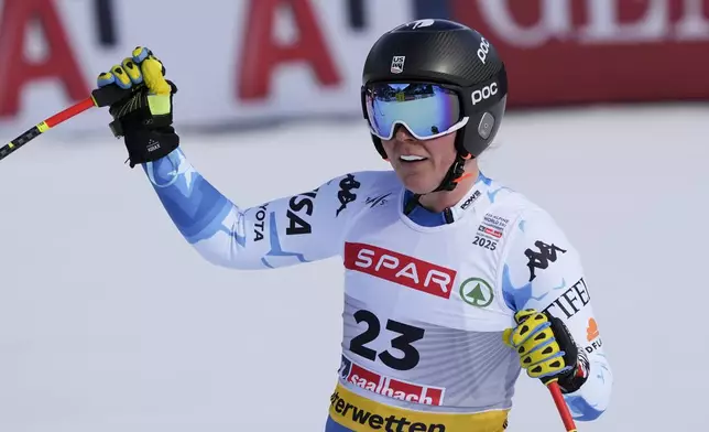 United States' Breezy Johnson celebrates at the finish area of a women's Super-G, at the Alpine Ski World Championships, in Saalbach-Hinterglemm, Austria, Thursday, Feb. 6, 2025. (AP Photo/Giovanni Auletta)