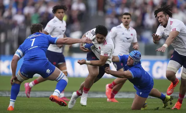 France's Louis Bielle-Biarrey in action, during the Six Nations rugby union match between Italy and France at the Olympic stadium, in Rome, Sunday, Feb. 23, 2025. (Alfredo Falcone/LaPresse via AP)