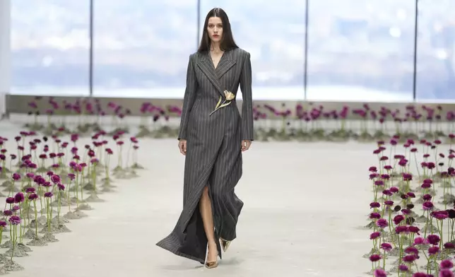 A model walks the runway during the Carolina Herrera Fall/Winter 2025 fashion show as part of New York Fashion Week on Monday, Feb. 10, 2025, in New York. (Photo by Charles Sykes/Invision/AP)