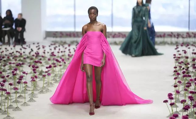 A model walks the runway during the Carolina Herrera Fall/Winter 2025 fashion show as part of New York Fashion Week on Monday, Feb. 10, 2025, in New York. (Photo by Charles Sykes/Invision/AP)