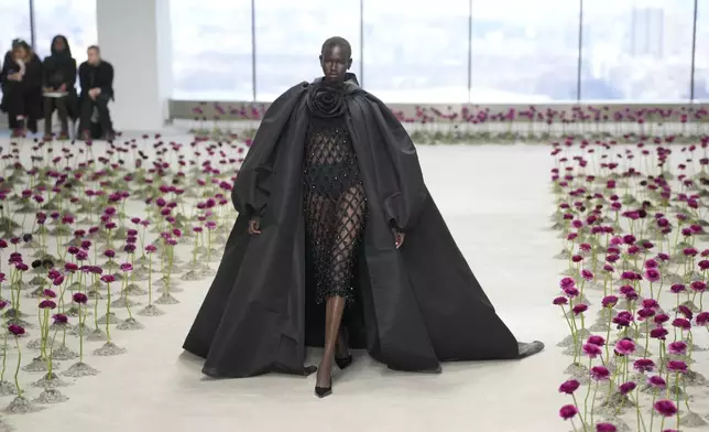 A model walks the runway during the Carolina Herrera Fall/Winter 2025 fashion show as part of New York Fashion Week on Monday, Feb. 10, 2025, in New York. (Photo by Charles Sykes/Invision/AP)