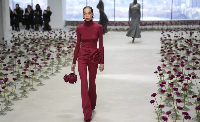 Models walk the runway during the Carolina Herrera Fall/Winter 2025 fashion show as part of New York Fashion Week on Monday, Feb. 10, 2025, in New York. (Photo by Charles Sykes/Invision/AP)