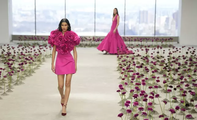 Models walk the runway during the Carolina Herrera Fall/Winter 2025 fashion show as part of New York Fashion Week on Monday, Feb. 10, 2025, in New York. (Photo by Charles Sykes/Invision/AP)