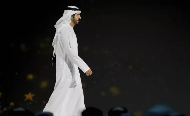 Dubai Crown Prince Sheikh Hamdan bin Mohammed Al Maktoum arrives at a ceremony to present the Global Teacher Prize in Dubai, United Arab Emirates, Thursday, Feb. 13, 2025. (AP Photo/Altaf Qadri)