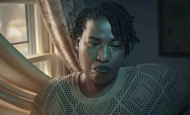 Widow Sharline Volcy poses for a portrait on Monday, Feb. 3, 2025, in Orange, N.J. (AP Photo/Andres Kudacki)