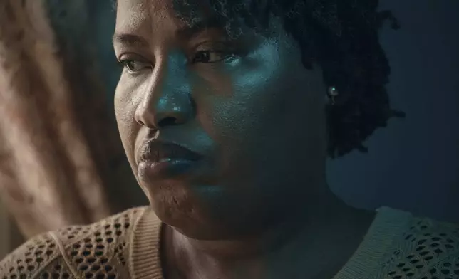 Widow Sharline Volcy poses for a portrait on Monday, Feb. 3, 2025, in Orange, N.J. (AP Photo/Andres Kudacki)