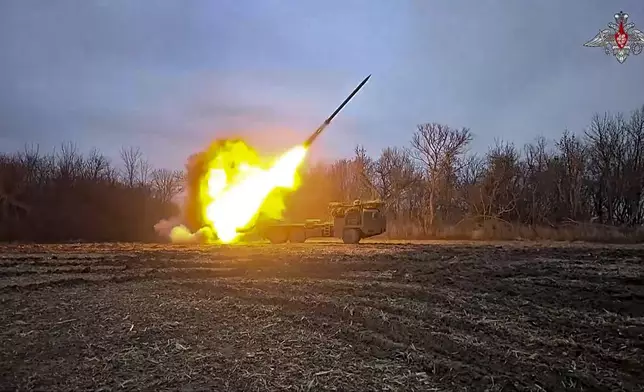 In this photo taken from a video distributed by Russian Defense Ministry Press Service on Thursday, Feb. 6, 2025, a Russian self-propelled multiple rocket launcher Uragan (Hurricane) is fired toward Ukrainian position at an undisclosed location in the Kursk region border area. (Russian Defense Ministry Press Service via AP)