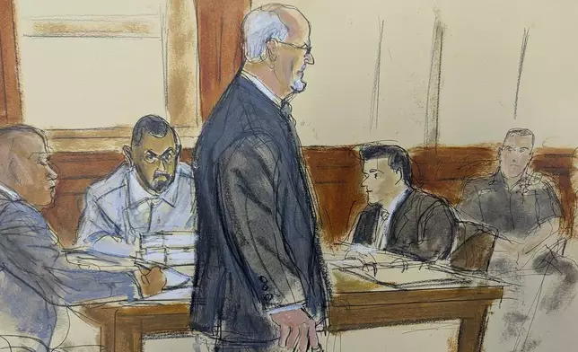 In this courtroom sketch, Hadi Matar, second from left, stares at Salman Rushdie as he walks into court to testify at Chautauqua County Court, Tuesday, Feb. 11, 2025, in Maryville, N.Y. (Elizabeth Williams via AP)