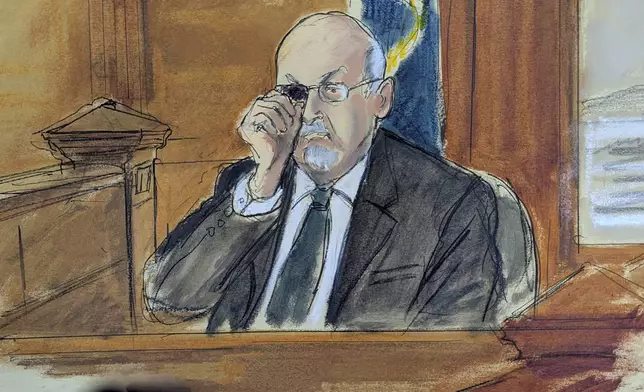 In this courtroom sketch, Salman Rushdie testifies on the witness stand, during the trial of Hadi Matar, Tuesday, Feb. 11, 2025 in Mayville, N.Y. showing how he was stabbed in the eye, when he was attacked in 2022. (Elizabeth Williams via AP)
