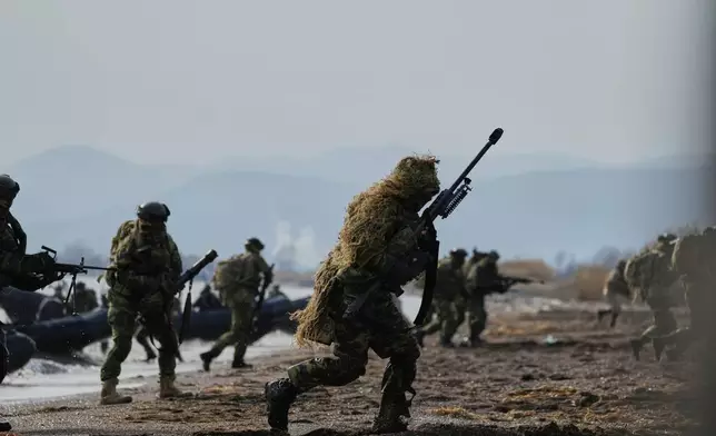 Spanish special Forces participate in the Steadfast Dart 2025 exercise, involving some 10,000 troops in three different countries from nine nations and represent the largest NATO operation planned this year, in Nea Anchialos, central Greece, Thursday, Feb. 13, 2025. (AP Photo/Thanassis Stavrakis)