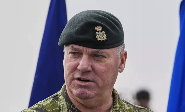 Deputy Commander Canadian Army Lieutenant General Peter K. Scott speaks to the press after the end of the second day of the Steadfast Dart 2025 exercise, involving some 10,000 troops in three different countries from nine nations and represent the largest NATO operation planned this year, in Nea Anchialos, central Greece, Thursday, Feb. 13, 2025. (AP Photo/Thanassis Stavrakis)