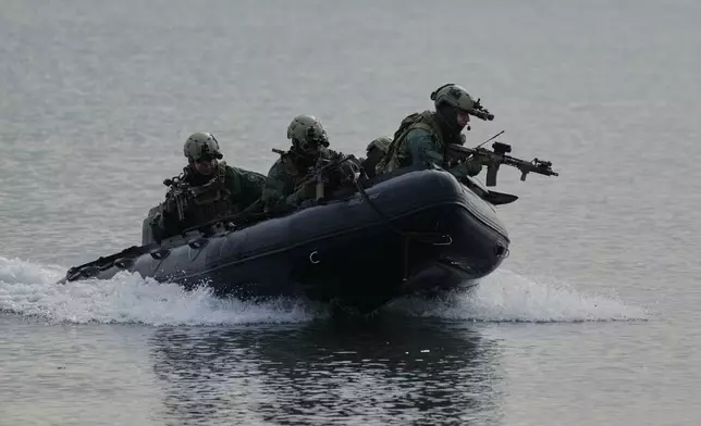 Greek Special Forces participate in the Steadfast Dart 2025 exercise, involving some 10,000 troops in three different countries from nine nations and represent the largest NATO operation planned this year, in Nea Anchialos, central Greece, Thursday, Feb. 13, 2025. (AP Photo/Thanassis Stavrakis)