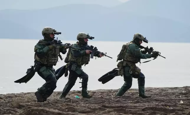 Greek Special Forces participate in the Steadfast Dart 2025 exercise, involving some 10,000 troops in three different countries from nine nations and represent the largest NATO operation planned this year, in Nea Anchialos, central Greece, Thursday, Feb. 13, 2025. (AP Photo/Thanassis Stavrakis)