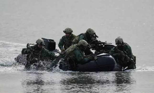 Greek Special Forces participate in the Steadfast Dart 2025 exercise, involving some 10,000 troops in three different countries from nine nations and represent the largest NATO operation planned this year, in Nea Anchialos, central Greece, Thursday, Feb. 13, 2025. (AP Photo/Thanassis Stavrakis)