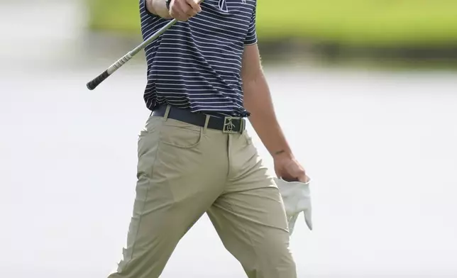 Jake Knapp walks on the 18th hole during the first round of the Cognizant Classic golf tournament, Thursday, Feb. 27, 2025, in Palm Beach Gardens, Fla. (AP Photo/Rebecca Blackwell)