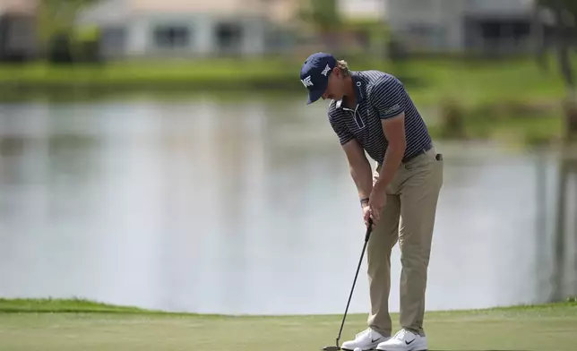 Jake Knapp putts on the 18th hole on his way to finishing with a 59 in his first round at the Cognizant Classic golf tournament, Thursday, Feb. 27, 2025, in Palm Beach Gardens, Fla. (AP Photo/Rebecca Blackwell)