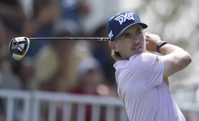 Jake Knapp, of the United States, watches his shot on the first tee during the first round of the Mexico Open golf tournament in Puerto Vallarta, Mexico, Thursday, Feb. 20, 2025. (AP Photo/Fernando Llano)