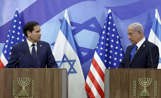 U.S. Secretary of State Marco Rubio, left, and Israeli Prime Minister Benjamin Netanyahu attend a news conference at the Prime Minister's office in Jerusalem, Israel, Sunday, Feb. 16, 2025. (Evelyn Hockstein/Pool Photo via AP)