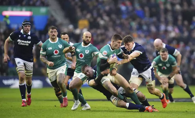 Ireland's Sam Prendergast in action during the Six Nations match between Scotland and Ireland at Murrayfield Stadium, Edinburgh, Sunday Feb. 9, 2025. (Andrew Milligan/PA via AP)
