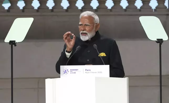 India's Prime Minister Narendra Modi addresses the audience at the Grand Palais during the Artificial Intelligence Action Summit in Paris, Tuesday, Feb. 11, 2025. (AP Photo/Michel Euler)