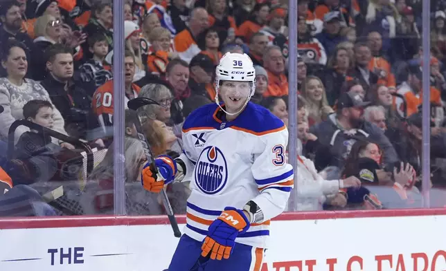 Edmonton Oilers' John Klingberg reacts after scoring a goal during the first period of an NHL hockey game against the Philadelphia Flyers, Saturday, Feb. 22, 2025, in Philadelphia. (AP Photo/Matt Slocum)