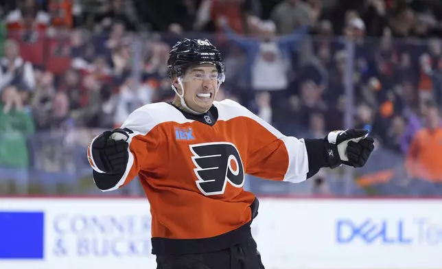 Philadelphia Flyers' Andrei Kuzmenko reacts after scoring goal during the second period of an NHL hockey game against the Edmonton Oilers, Saturday, Feb. 22, 2025, in Philadelphia. (AP Photo/Matt Slocum)