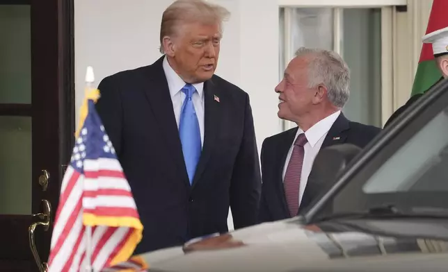 President Donald Trump greets Jordan's King Abdullah II at the White House, Tuesday, Feb. 11, 2025, in Washington. (AP Photo/Evan Vucci)