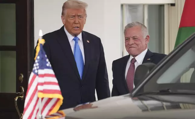 President Donald Trump greets Jordan's King Abdullah II at the White House, Tuesday, Feb. 11, 2025, in Washington. (AP Photo/Evan Vucci)