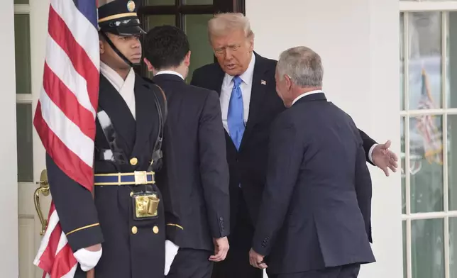 President Donald Trump greets Jordan's King Abdullah II, right, and Crown Prince Hussein at the White House, Tuesday, Feb. 11, 2025, in Washington. (AP Photo/Evan Vucci)