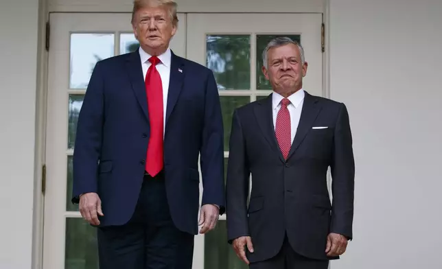 FILE - President Donald Trump stands with Jordan's King Abdullah II at the White House, June 25, 2018, in Washington. (AP Photo/Evan Vucci, File)