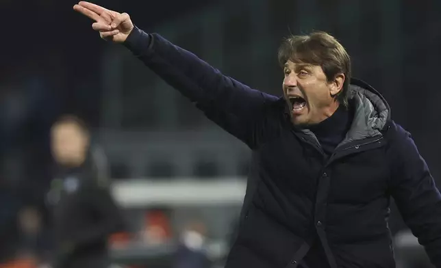 Napoli's head coach Antonio Conte during the Serie A soccer match between Napoli and Udinese at the Diego Armando Maradona Stadium in Naples, Italy, Sunday Feb. 9, 2025. (Alessandro Garofalo/LaPresse via AP)