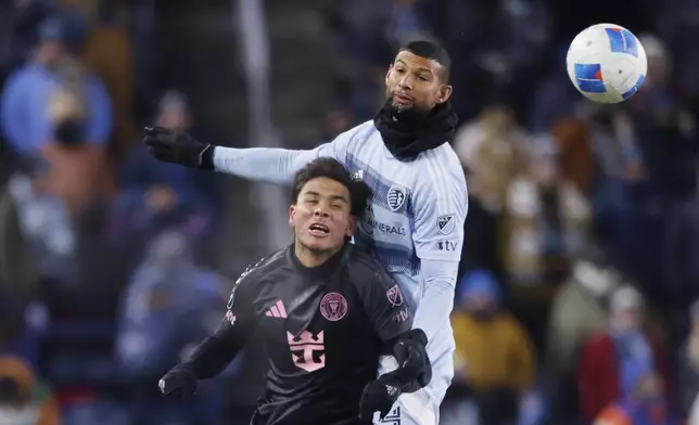 Inter Miami forward Leonardo Campana, left, and Sporting Kansas City defender Joaquín, right, go up for the ball during the second half of a CONCACAF Champions Cup soccer match, Wednesday, Feb. 19, 2025, in Kansas City, Kan. (AP Photo/Colin E. Braley)