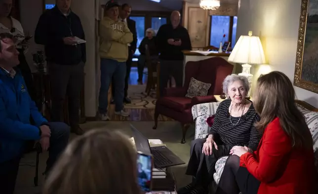 Malphine Fogel, 95, left, sits with Sasha Phillips, Counsel with Dentons Cohen &amp; Grigsby, as they talk during a press conference about her son, Marc Fogel, who was a Russian detainee for three and a half years and is now on his way home, Tuesday, Feb. 11, 2025, in Butler, Pa. (Benjamin B. Braun/Pittsburgh Post-Gazette via AP)