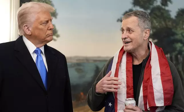 President Donald Trump, accompanied by Marc Fogel, speaks in the Diplomatic Reception Room at the White House, Tuesday, Feb. 11, 2025, in Washington. (Photo/Alex Brandon)
