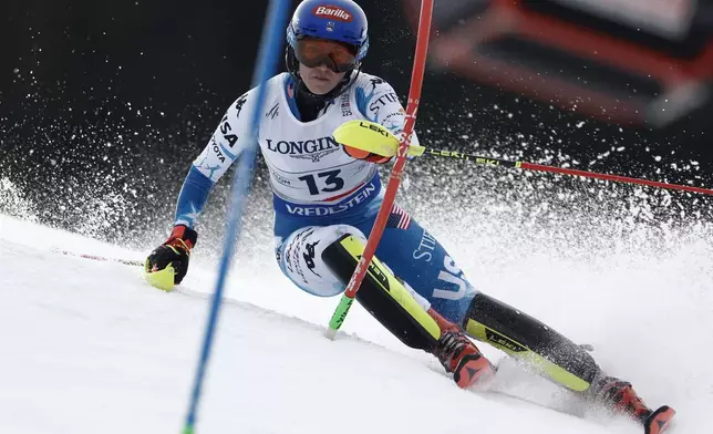 United States' Mikaela Shiffrin competes in a slalom run of a women's team combined event, at the Alpine Ski World Championships, in Saalbach-Hinterglemm, Austria, Tuesday, Feb. 11, 2025. (AP Photo/Gabriele Facciotti)