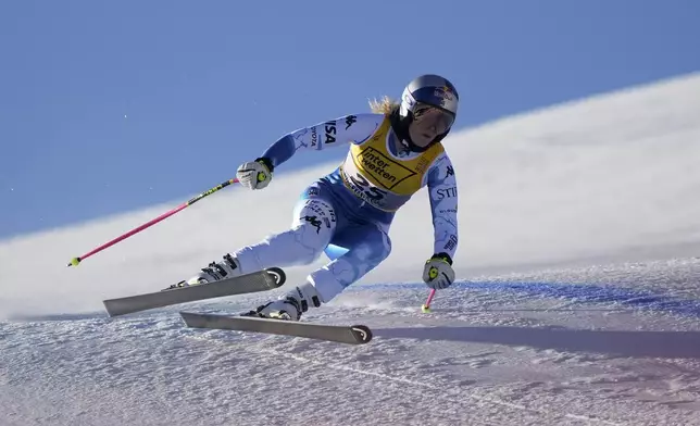 United States' Lindsey Vonn speeds down the course during a women's downhill training, at the Alpine Ski World Championships, in Saalbach-Hinterglemm, Austria, Wednesday, Feb. 5, 2025. (AP Photo/Giovanni Auletta)
