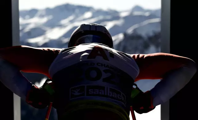 Switzerland's Marco Odermatt at the starting gate of a men's downhill training, at the Alpine Ski World Championships, in Saalbach-Hinterglemm, Austria, Wednesday, Feb. 5, 2025. (AP Photo/Gabriele Facciotti)